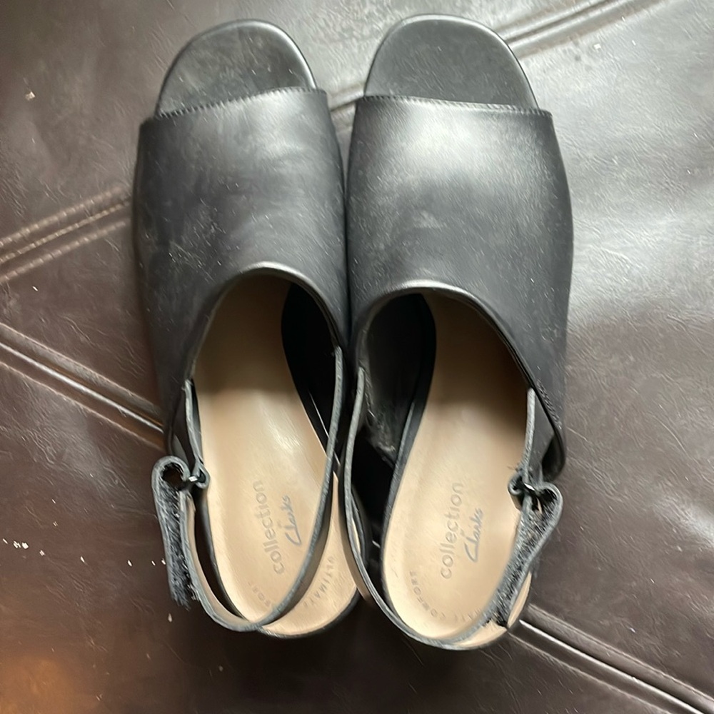 Clark’s leather open toe sandals.